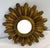 Love this pretty sunburst mirror. It looks like wood but feels more like ceramic so I’m not sure the frame material.