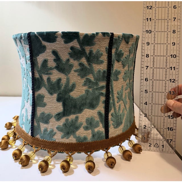 A richly detailed, custom-made drum lampshade featuring luxurious teal velvet in the striking Luv Bunny 504 Azure by...