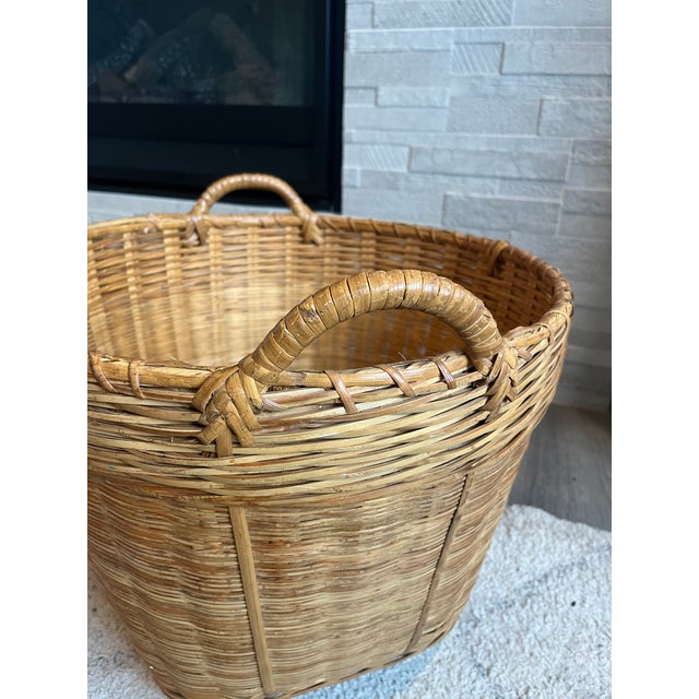 Farmhouse Mid 20th Century Round Tapered Woven Reed Basket Vintage Utility Laundry Basket With Reinforced Bottom and Wrapped Handles For Sale - Image 3 of 10
