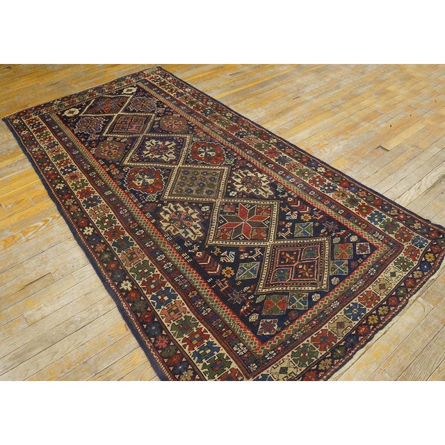 Antique Caucasian rug, measures: 3'6" x 7'4". Antique Caucasian Caucasian Blue 1900s Rug, Circa Date: 1900s. This...