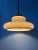 A space age pendant lamp by Herda with a beige, acrylic glass mushroom shade. The height of the lamp can be adjusted with...