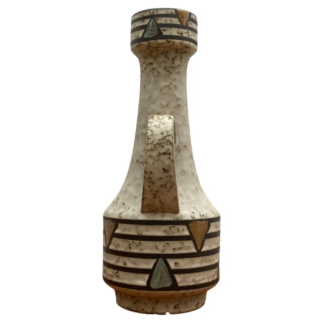 A ceramic vase designed with abstract figures in soft yellow and soft green manufactured in Germany, 1960s by Jasba, in...