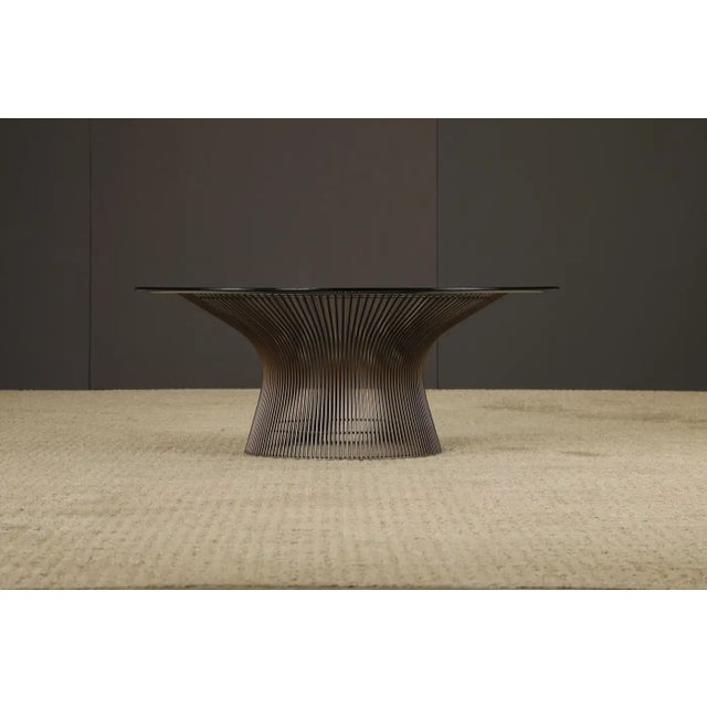 This iconic Platner Bronze Wire Coffee Table (circa 1970s) was designed by Warren Platner and produced by Knoll...