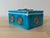 A wonderful midcentury pottery box by Ugo Zaccagnini featuring a dynamic applied bullseye motif on the top and sides. The...