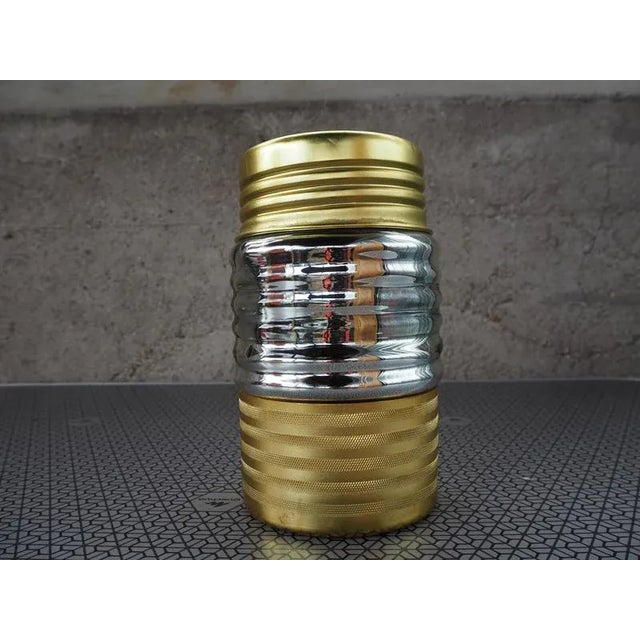 Made of Aluminum,Glass,Cork The thermos has the original label The aluminum surface shows signs of use, fully functional...