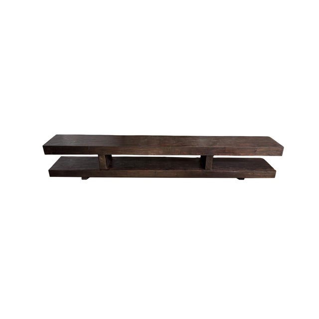 Crafted from solid teak wood, this architectural bench showcases the enduring beauty of one of the world's most celebrated...