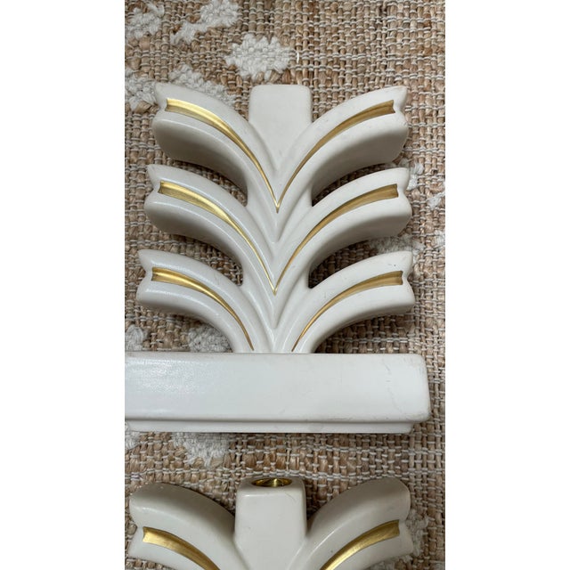 This product is a pair of vintage cream Geneva porcelain Art Deco pottery candle holders. The elegant design and high-...