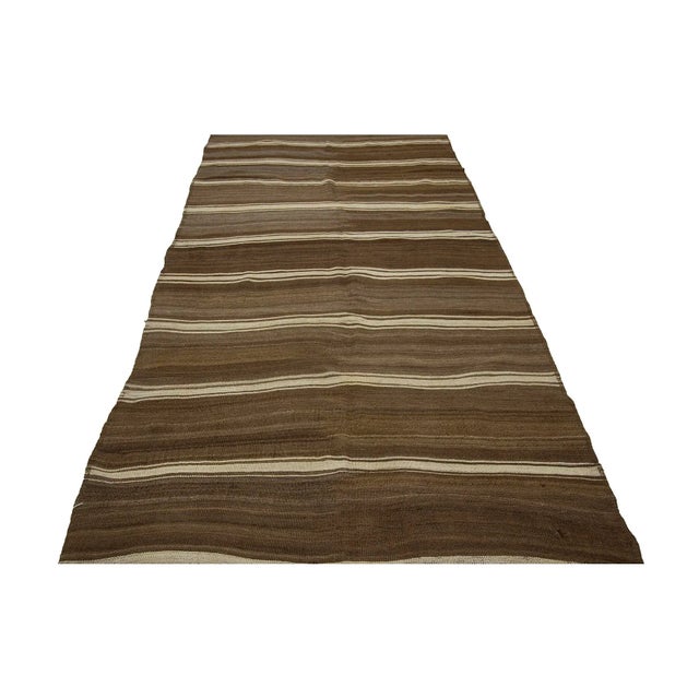 Handwoven vintage natural kilim rug from Kars region of Turkey. Approximately 50-60 years old. In very good condition