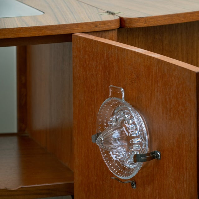 Brown Mid-Century English Teak Bar Cabinet with Interior Lighting, Mirrored Back and Accessories, 1960s For Sale - Image 8 of 9