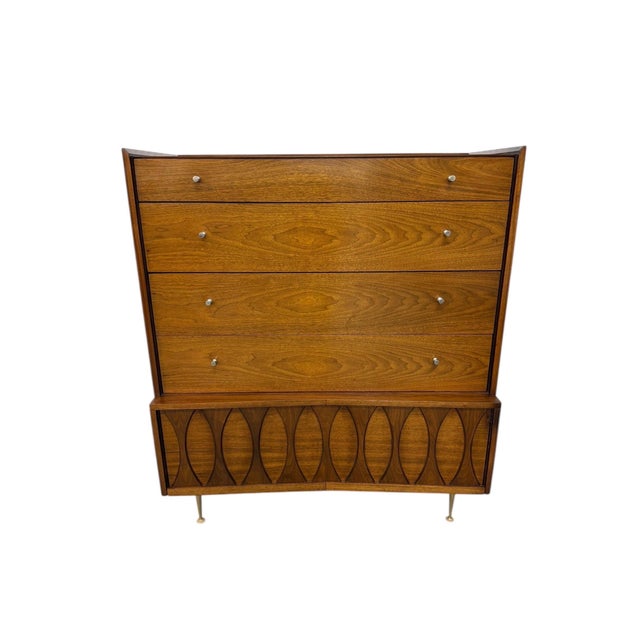 Striking 1960s Mid-Century Modern walnut high chest in the coveted Catseye style, showcasing beautifully grained drawer...