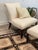 This classic chair and ottoman was made by Barbara Barry for Baker furniture. The wood is mahogany. There is minimal wear....