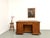 Maison Lecan presents this large antique shop counter from the early 20th century, remarkable for its double-sided design....