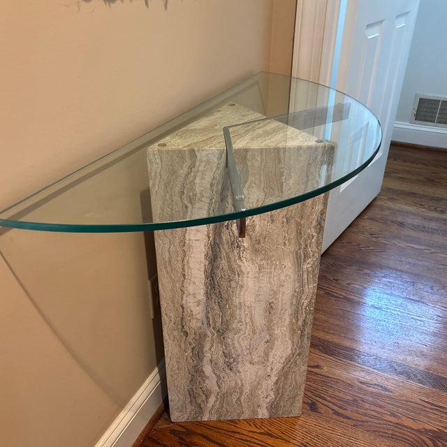 Lovely postmodern console table with fantastic versatility. Overall width at back of glass is 38.25”x 16.5” deep and...