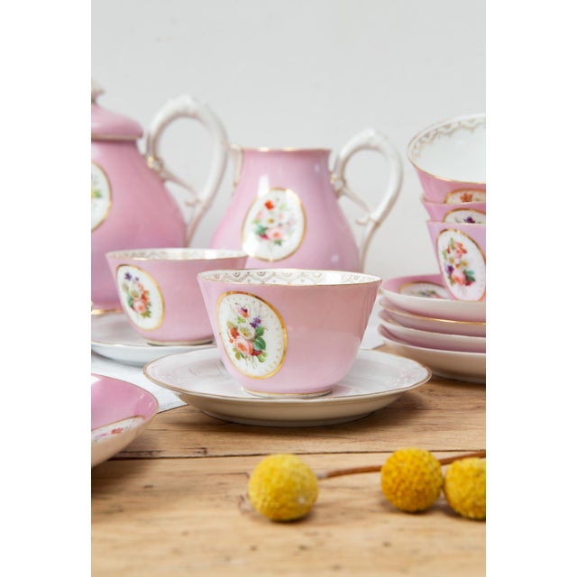 It's made of porcelain known as Old Paris or Old Limoges. Some of the original saucers were missing, so in addition to the...