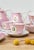 It's made of porcelain known as Old Paris or Old Limoges. Some of the original saucers were missing, so in addition to the...