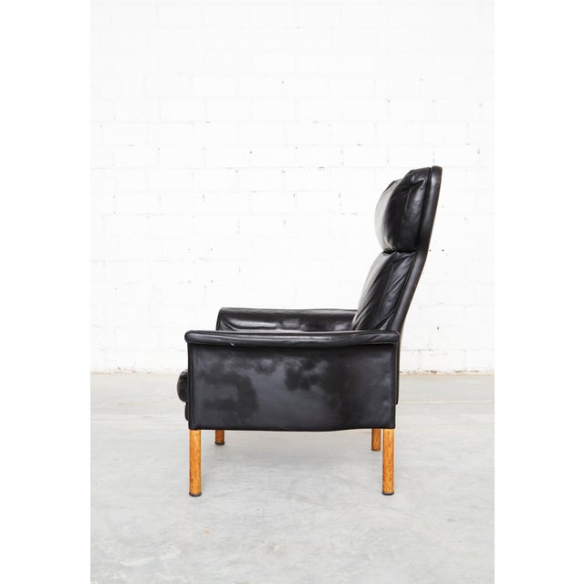 Condition: Good condition with moderate signs of wear. The foam on the armrests is hardened in places. One wooden leg has...