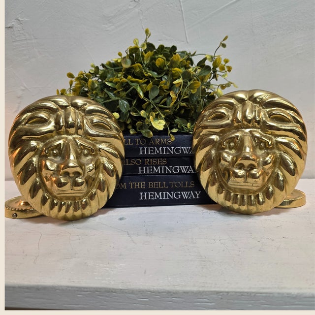 Regal, weighty, and unapologetically glamorous, this pair of solid brass lion head curtain tiebacks brings instant...