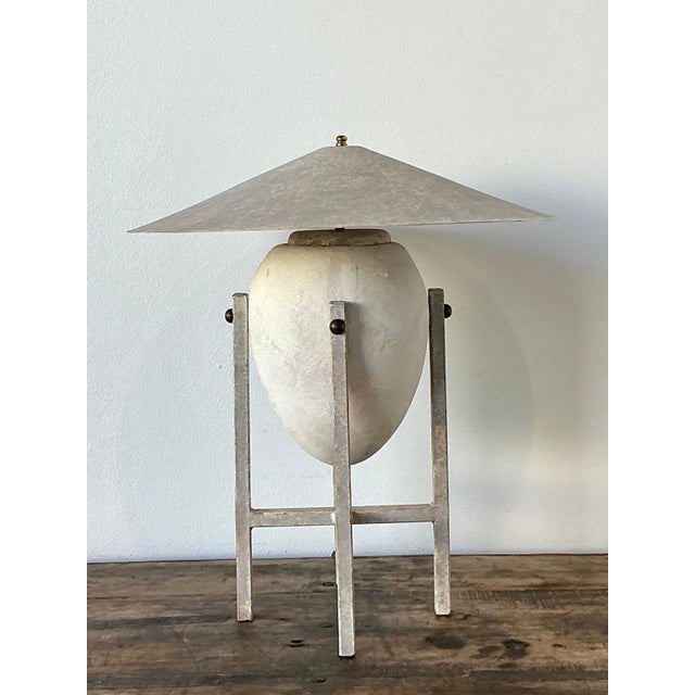 Embrace the architectural rigor of the postmodern era with this exceptional table lamp, designed in the sophisticated...