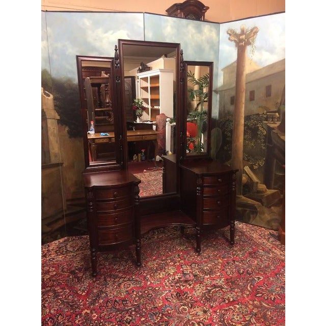 Item: Antique Mahogany Vanity. Age & Condition: Circa 1930. Refinished, new mirror glass installed. Dimensions: 53″ wide x...
