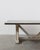 Zinc-top trestle table with a heart pine wood base, dated by the owner to approximately 1990–2000. The distressed zinc top...