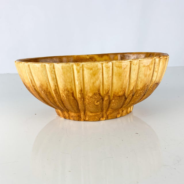 Amazing vintage Haeger pottery planter with gold/orange/brown drippy glaze. Great mid century modern look. Love the...