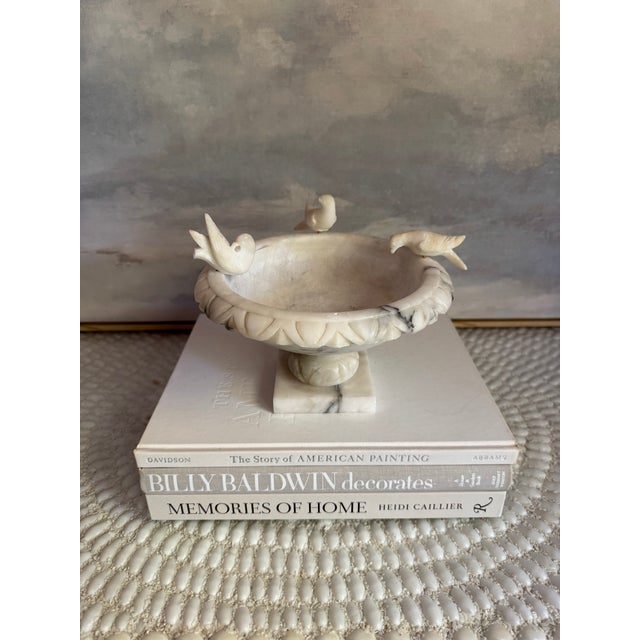 Vintage alabaster bird bath with three birds. There is a fourth hole, one bird is missing. Measures approximately 4.5”...