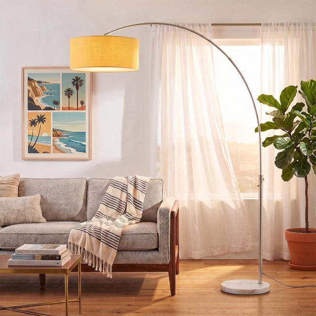 An authentic 1960s design by Peter Morelli, reborn for modern homes, this satin nickel and marble arc lamp isn't a...