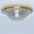 A stunning high-end brass and frosted glass flushmount manufactured in the late 1960s-early 1970s. The brass ring holds a...