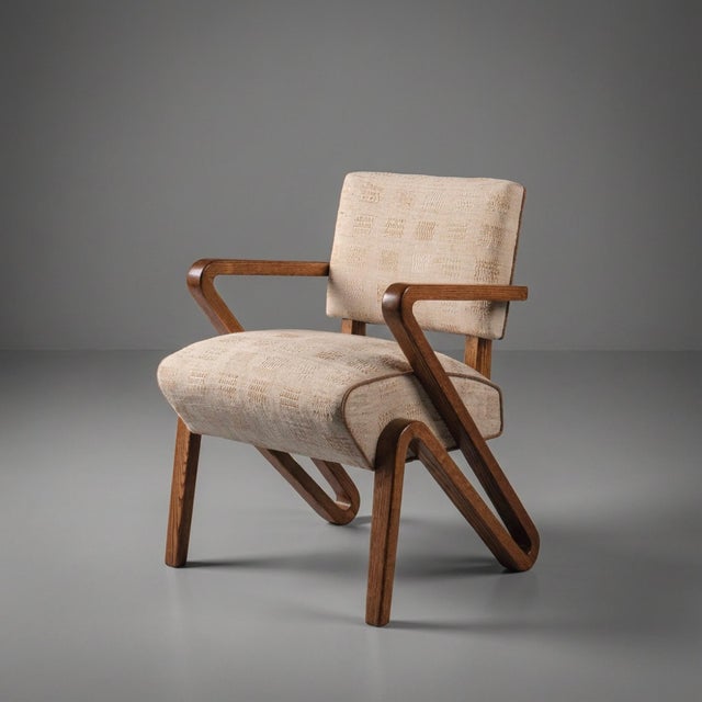 At a Glance: - Rare Mid-Century sculptural lounge chair with a dramatic grasshopper-inspired profile. - Solid white oak...