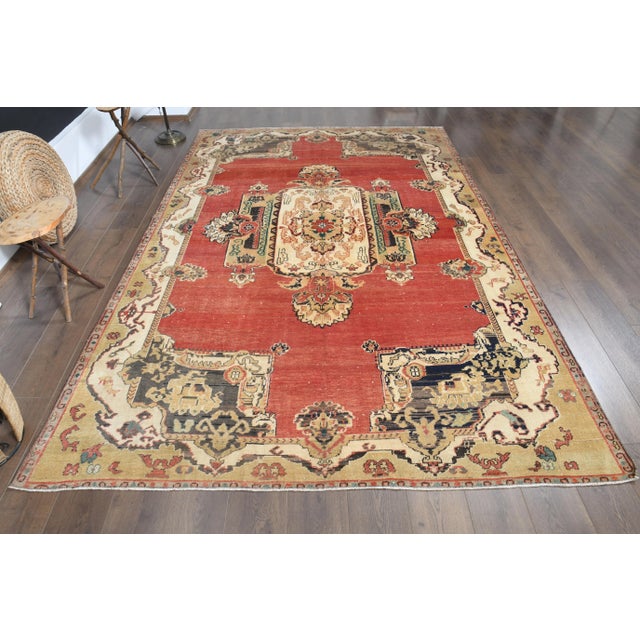 Vintage Turkish Hand-Knotted vintage rug is a semi-antique vintage area rug. The '70s Eastern region of Turkey's unique...