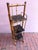 Antique Burnt tortoise rattan etagere. Three Black lacquered Japonisme shelves. Great scale for a powder room. Brass caps...