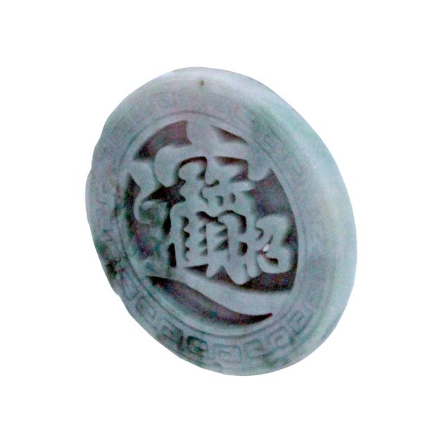 This beautiful round shape jade pendant is carved from natural untreated jade, the motif of this pendant is a Chinese word...