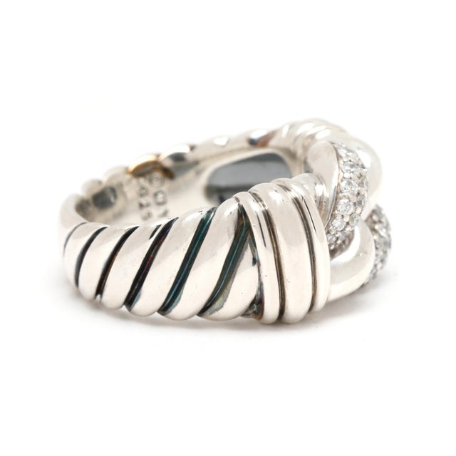Stones: diamond round brilliant cut .30ctw GH color/ SI1-I1 clarity Ring Size: 6 Rise Off Of Finger: 5.6 mm Width: 11.4 mm...