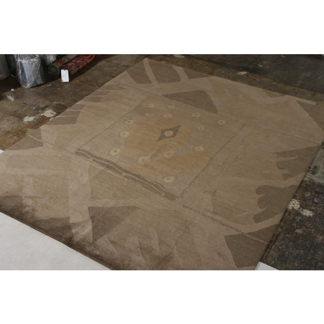 Hand knotted in a yarn mixing blending wool and silk this collectible by Rug & Kilim draws inspiration from the deco...