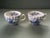 A pair of fluted blue and white china tea cups in the “Tulip Time” pattern. Ships within 1-2 days using USPS. All items...