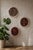 A matching set of three authentic vintage miniature rugs, hand-knotted in Tehran. The collection comprises two detailed...