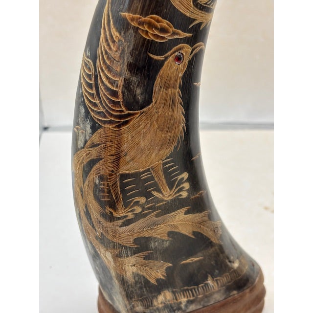 Stunning pair of hand etched designs, showcasing traditional artistry and natural form. Sculptures featuring phoenix's and...
