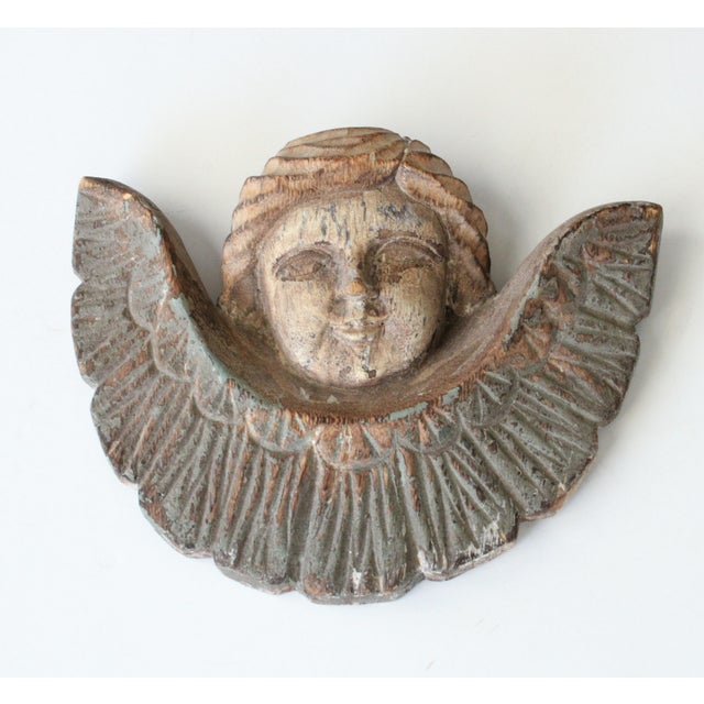 Vintage French style cherub carved of wood. Desirable patina throughout.