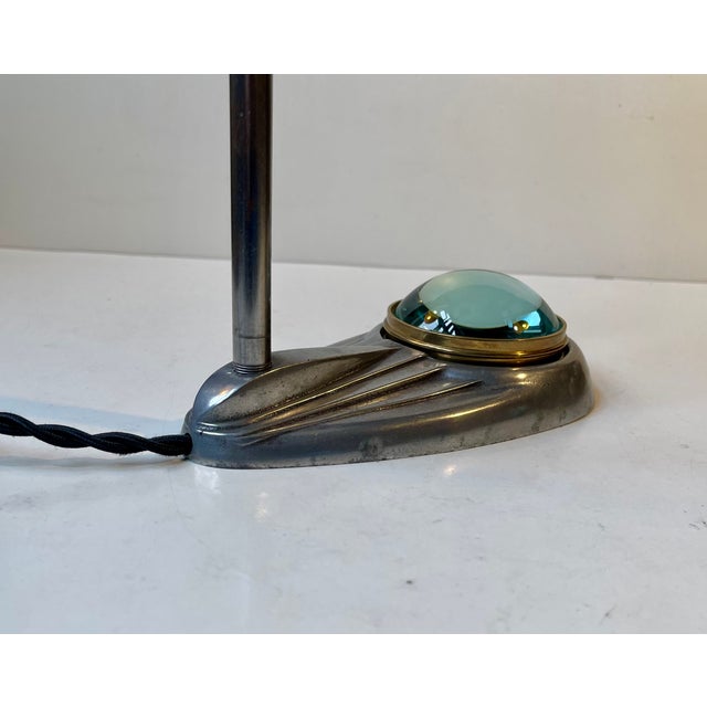 One of a kind table or desk light that came from the workshop of a Copenhagen Silver/goldsmith. It features a streamline...