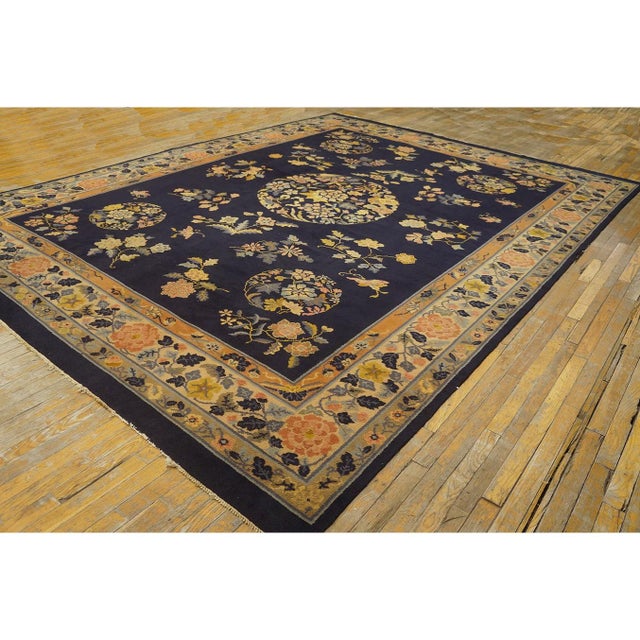 Antique Wool Blue Hand Knotted Pile Rug, Circa Date: 1920s. This exceptional Chinese Peking piece represents the...