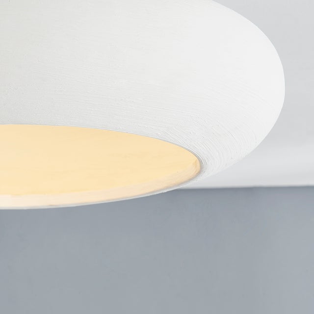 Reminiscent of a hand-thrown bowl, Annie is both modern and inviting. This soothing yet stylish white ceramic semi-flush...