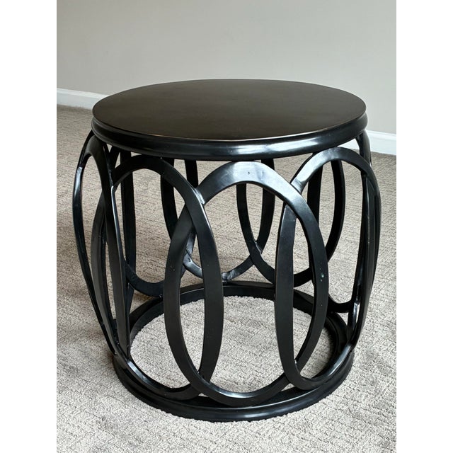 An elegant “Bracelet” accent table or stool designed by Barbara Barry for Baker Furniture. The sculptural design features...