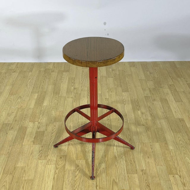 This industrial-style swivel stool is an authentic piece of 1950s modernism. Featuring a simple, sturdy design, it...