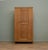 A handsome 1930s oak hall robe produced as part of a collaboration between Harris Lebus and Bath Cabinet Makers, bearing...