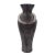 The black ore vases derive their name from a recent trip to a stone quarry. After watching massive sections of dark black...
