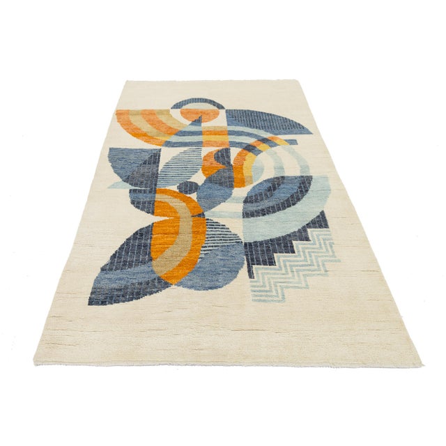 This beautiful 5x8 handcrafted wool rug combines mid-century modern style with bold Art Deco geometry. Its sophisticated...