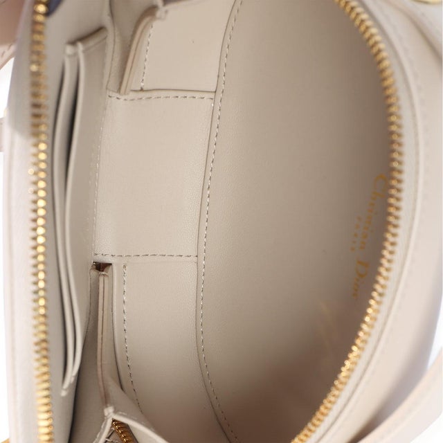 Cream Calfskin CD Signature Oval Crossbody Camera Bag For Sale - Image 9 of 9