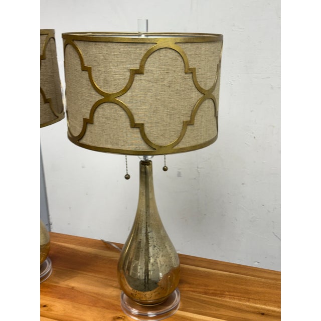 Design Plus Gallery presents a Pair of Westly Glass Table Lamps from Becky Fletcher. Each lamp has a handcrafted mercury...