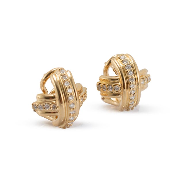 Brand: Tiffany & Co. Gender: Ladies Metal Type: 18K Yellow Gold Length: 0.50 inches Width: 12.60 mm Weight: 7.45 grams...