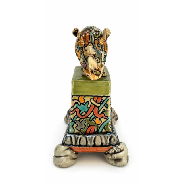Rhino with Plinth celebrates the quiet strength and enduring presence of one of nature's most remarkable animals through a...